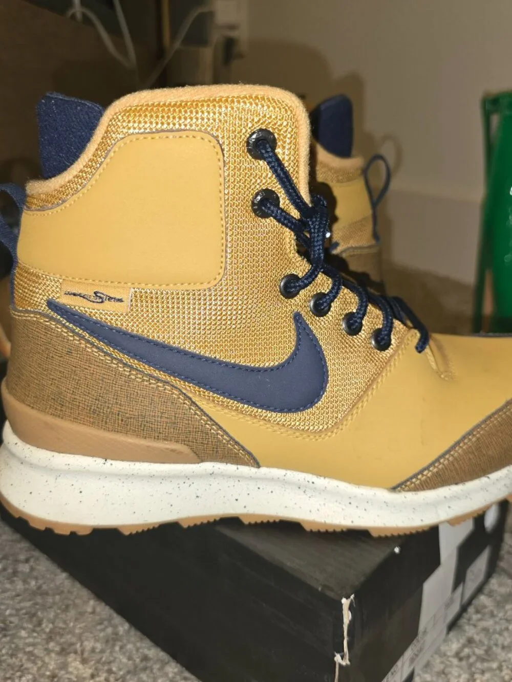 tan and navy Nike Stasis ACG GS 'Haystack' youth boots.
